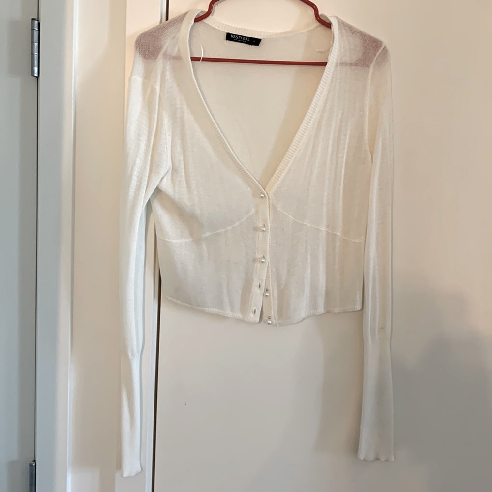 Light knit sweater with pearl detail